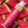 Cocosolis Watermelon Sun Tan & Body Oil with watermelons