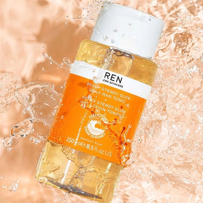 REN RADIANCE READY STEADY GLOW DAILY AHA TONIC in water