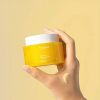 FRAIJOUR YUZU HONEY ALL CLEANSING BALM in hand