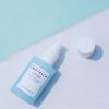 SKIN1004 MADAGASCAR CENTELLA HYALU-CICA BLUE SERUM open by the pool