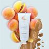 FLUFF BODY CREAM MOISTURIZING PEACH & CARAMEL peaches and caramel around